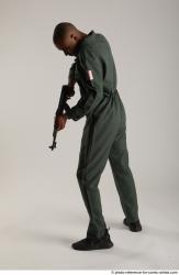 Man Adult Average Black Fighting with gun Standing poses Army